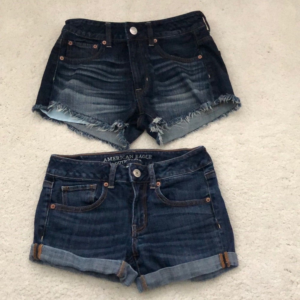 Both pairs of dark wash jean shorts